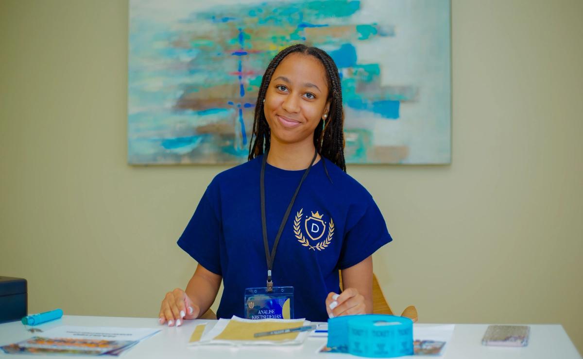 A welcoming educator at La Distinction Academy